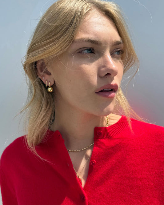 Simple yet chic, this ball chain necklace plated in 14k gold features a perfectly minimal design made to fit seamlessly into all your favorite layered looks.