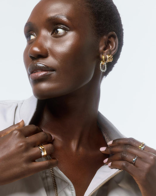 Brilliant with everything from a little black dress to weekend jeans, these delicate and small hoop earrings with squared-off inlay cubic zirconia are a must-have.