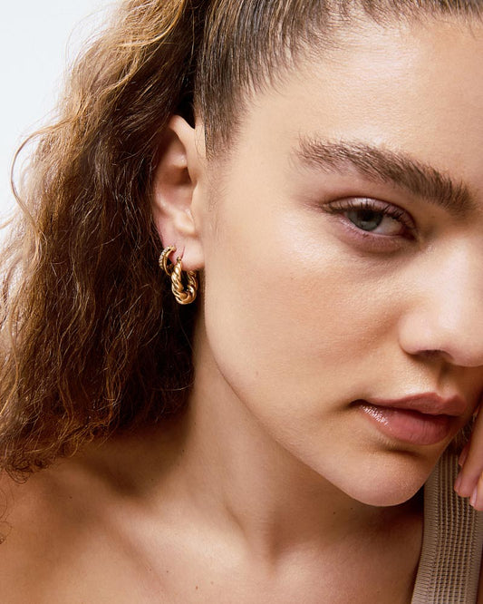 Getting a modern stacked look has never been easier – these double hoop earrings with sparkling cubic zirconia gems are this season's winning accessory.